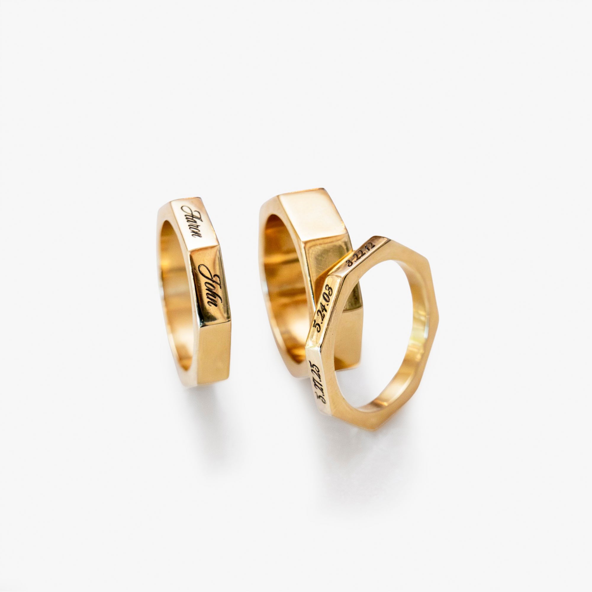 Eight-sided 14K gold ring, handcrafted with laser or hand engraving — a modern heirloom that tells your story.