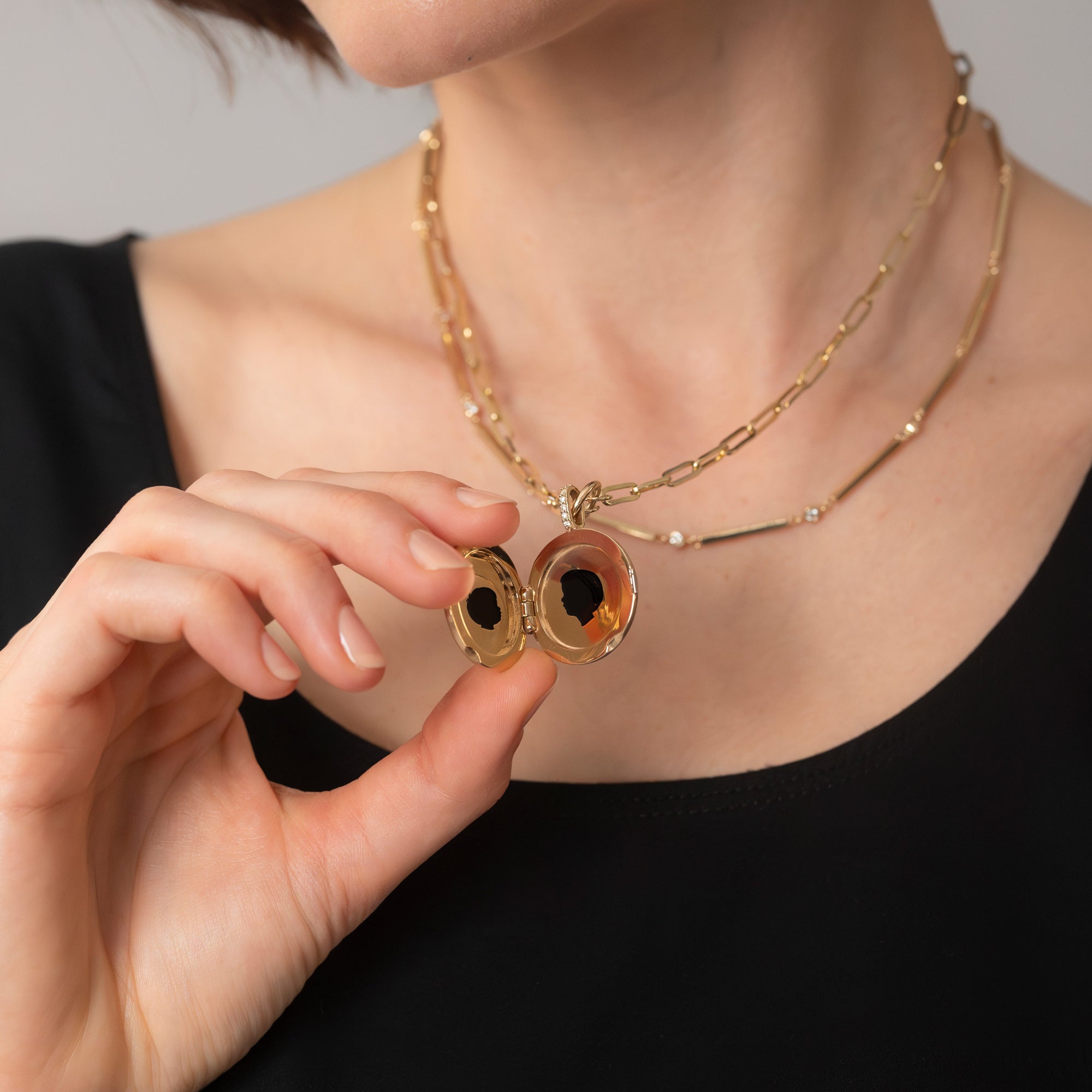 Vana Chupp Legacy Locket with silhouettes inside