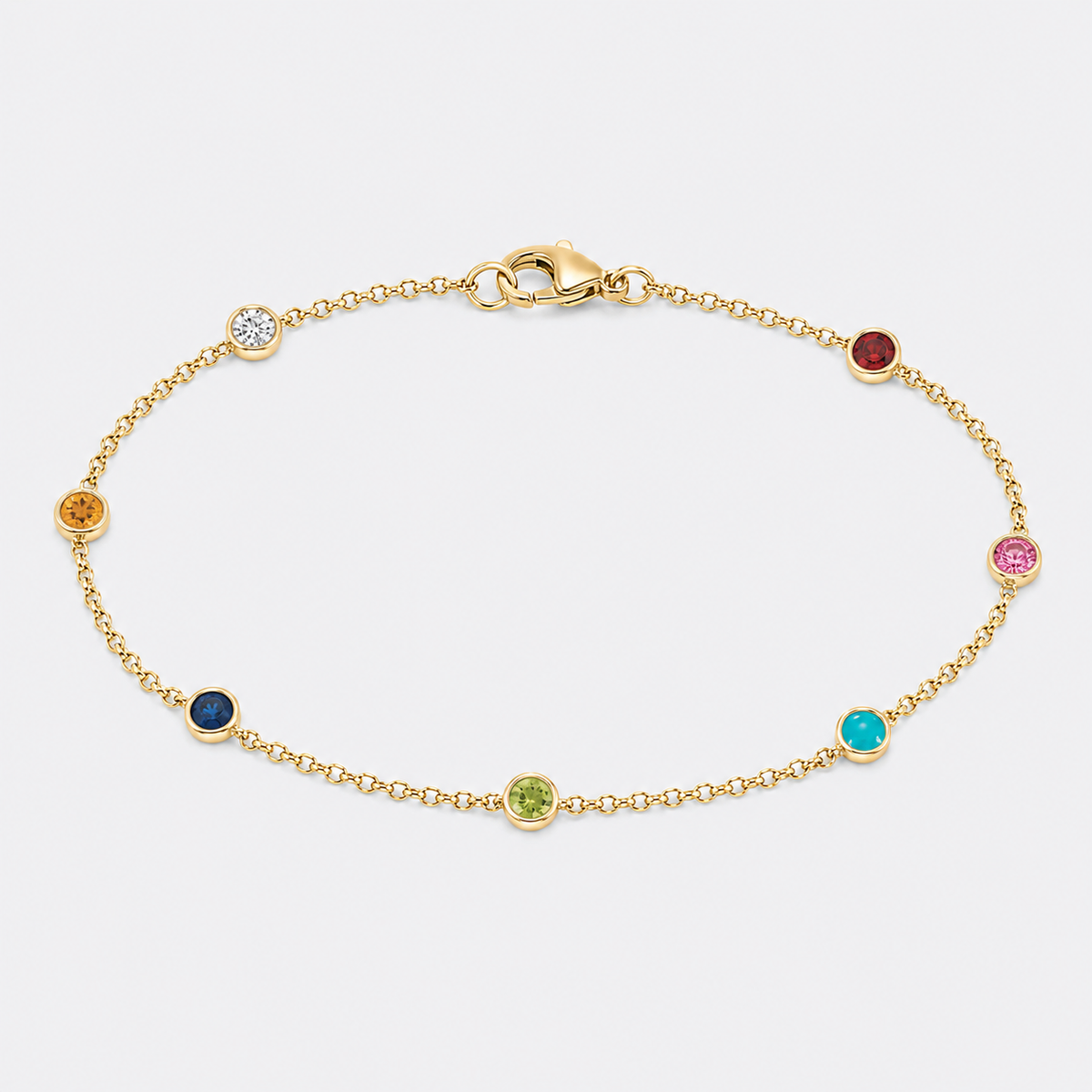 a delicate bracelet with 7 birthstones