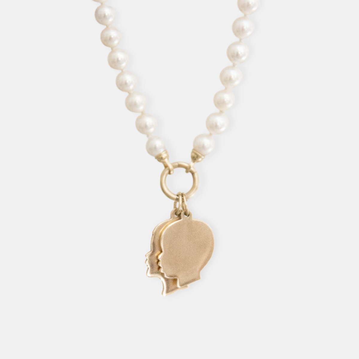 Pearl Necklace with Silhouette charms