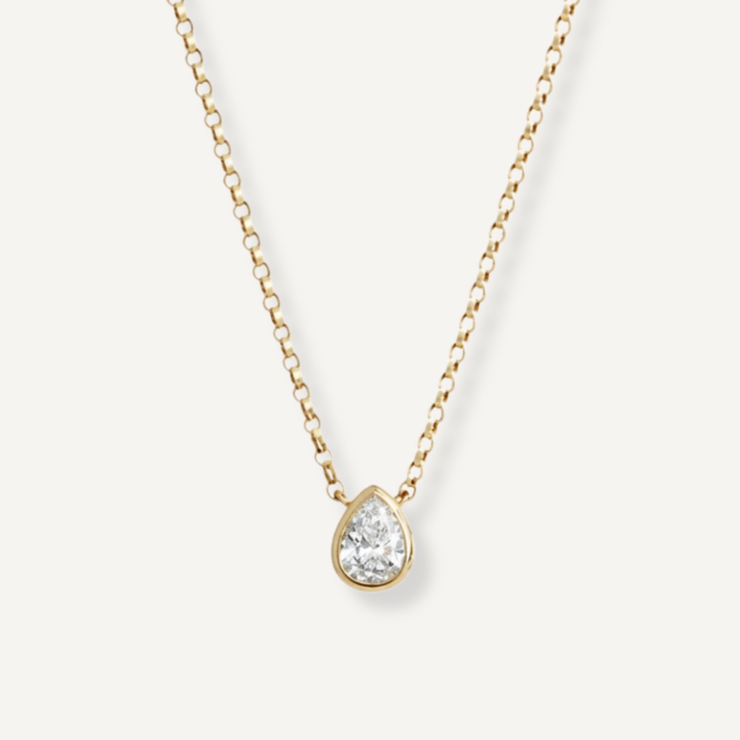 A custom pear shape diamond solitaire necklace