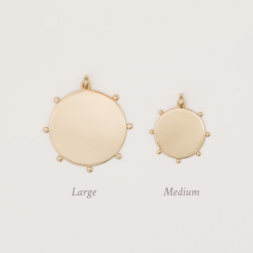 the two sizes of celestial medallions side by side