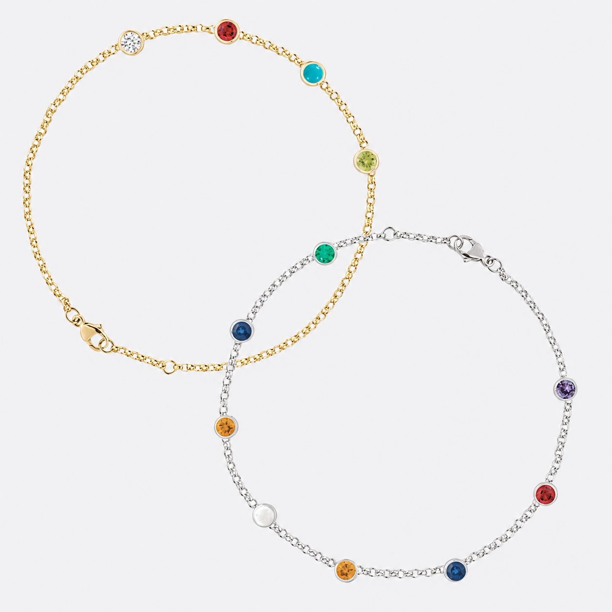 White and Yellow dainty chain bracelet with birthstones attached to the chain.