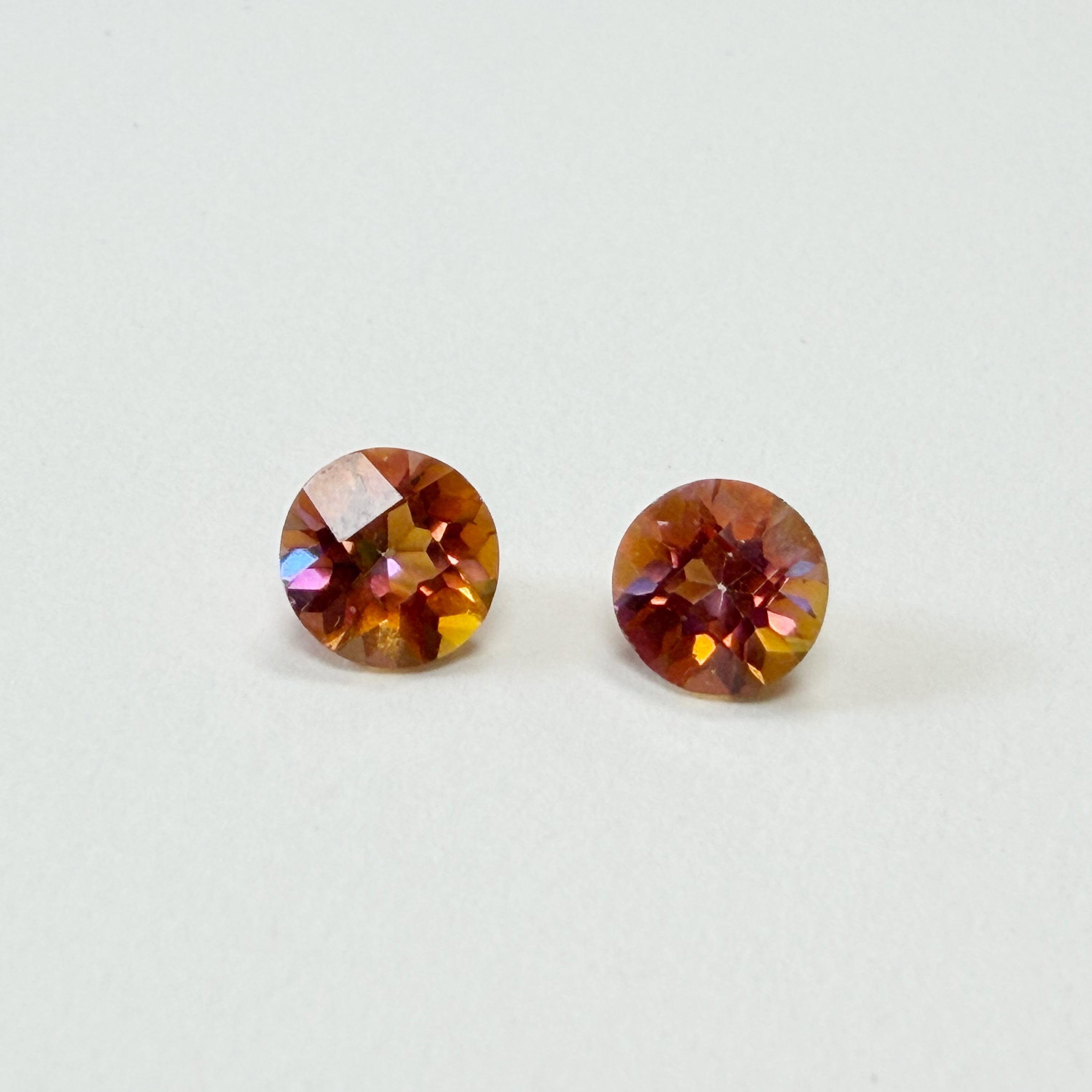 Pair of 7 mm Round Faceted Azotic Twilight Topaz