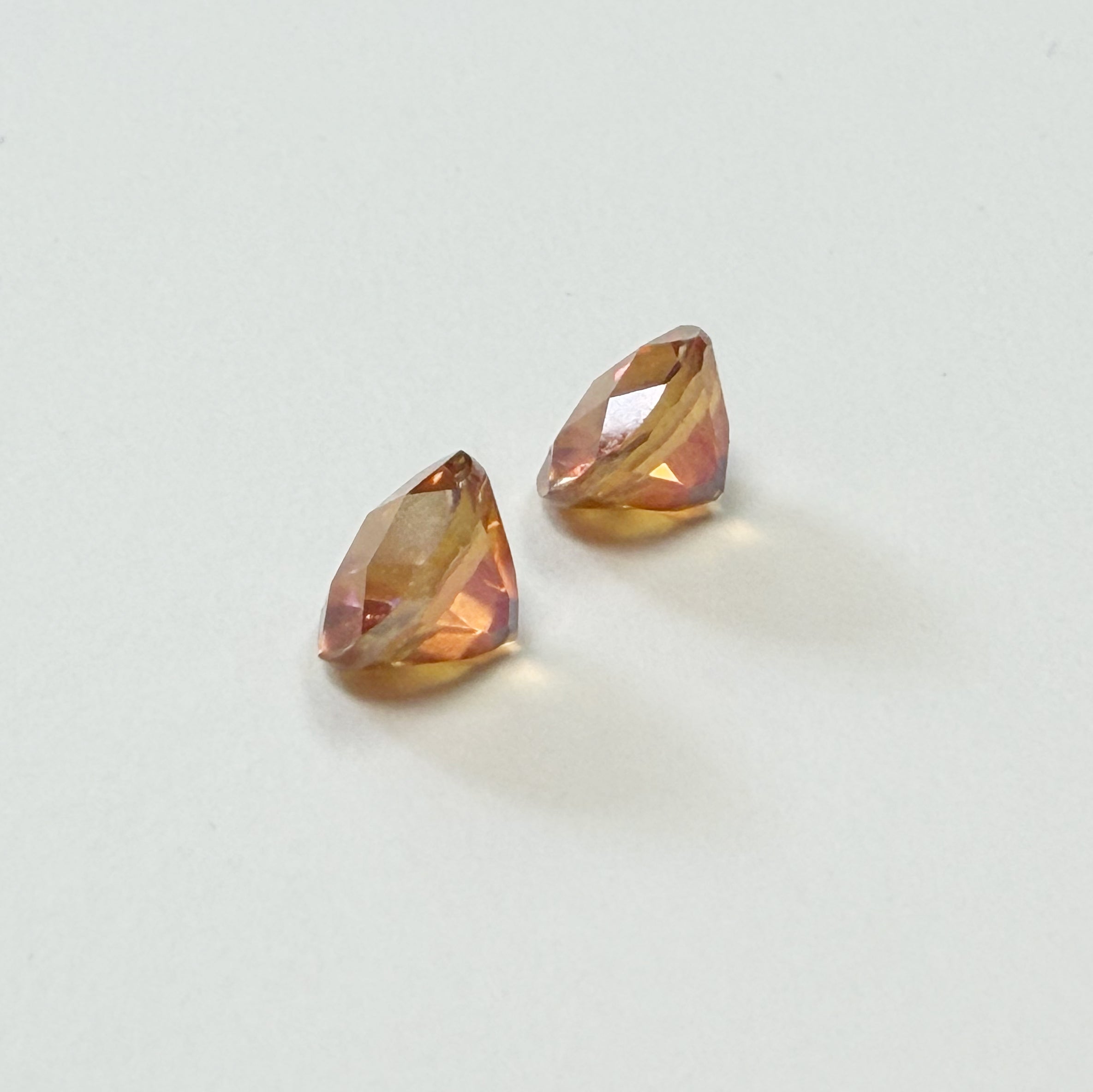 Pair of 7 mm Round Faceted Azotic Twilight Topaz