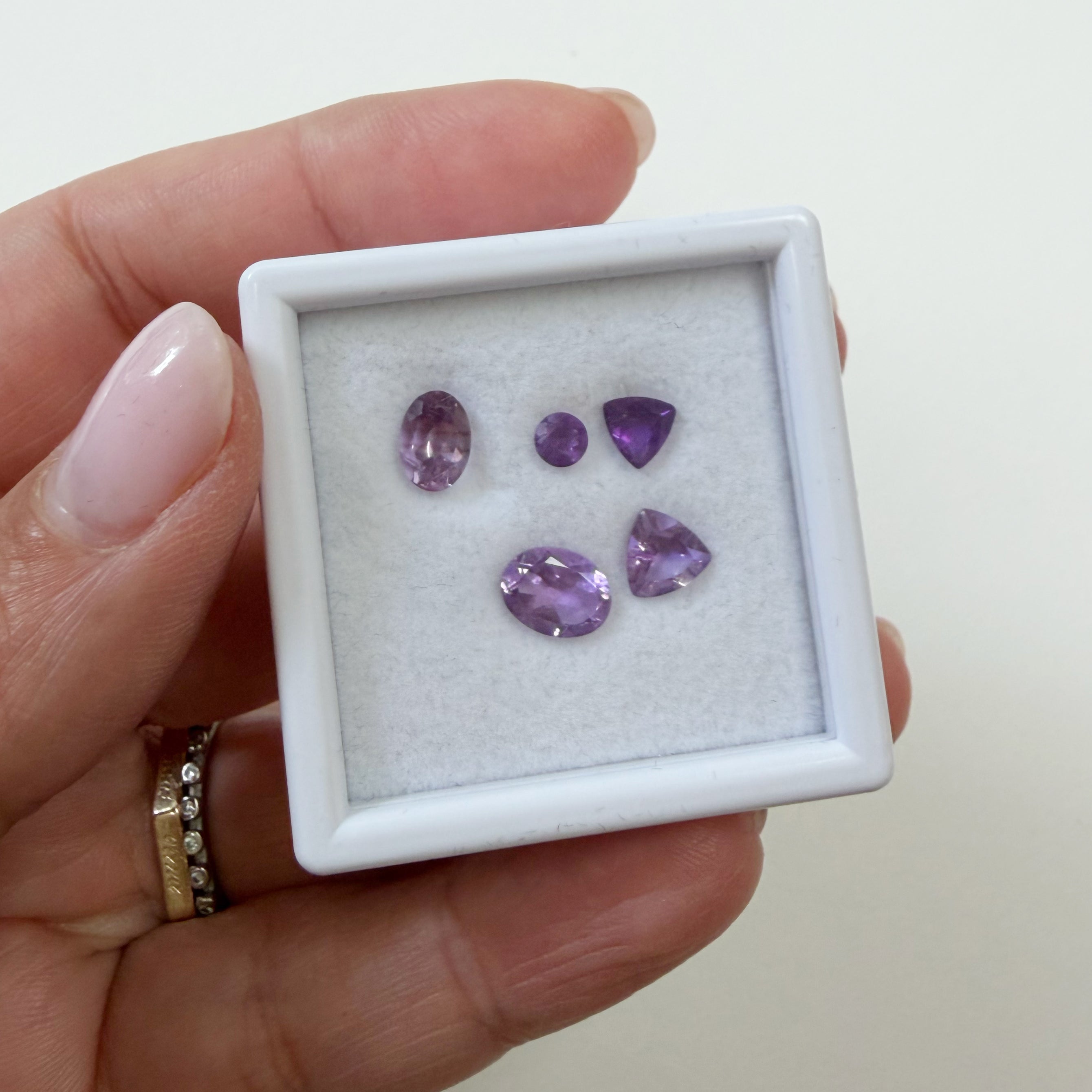 Parcel of Five Various Cuts Natural Amethysts