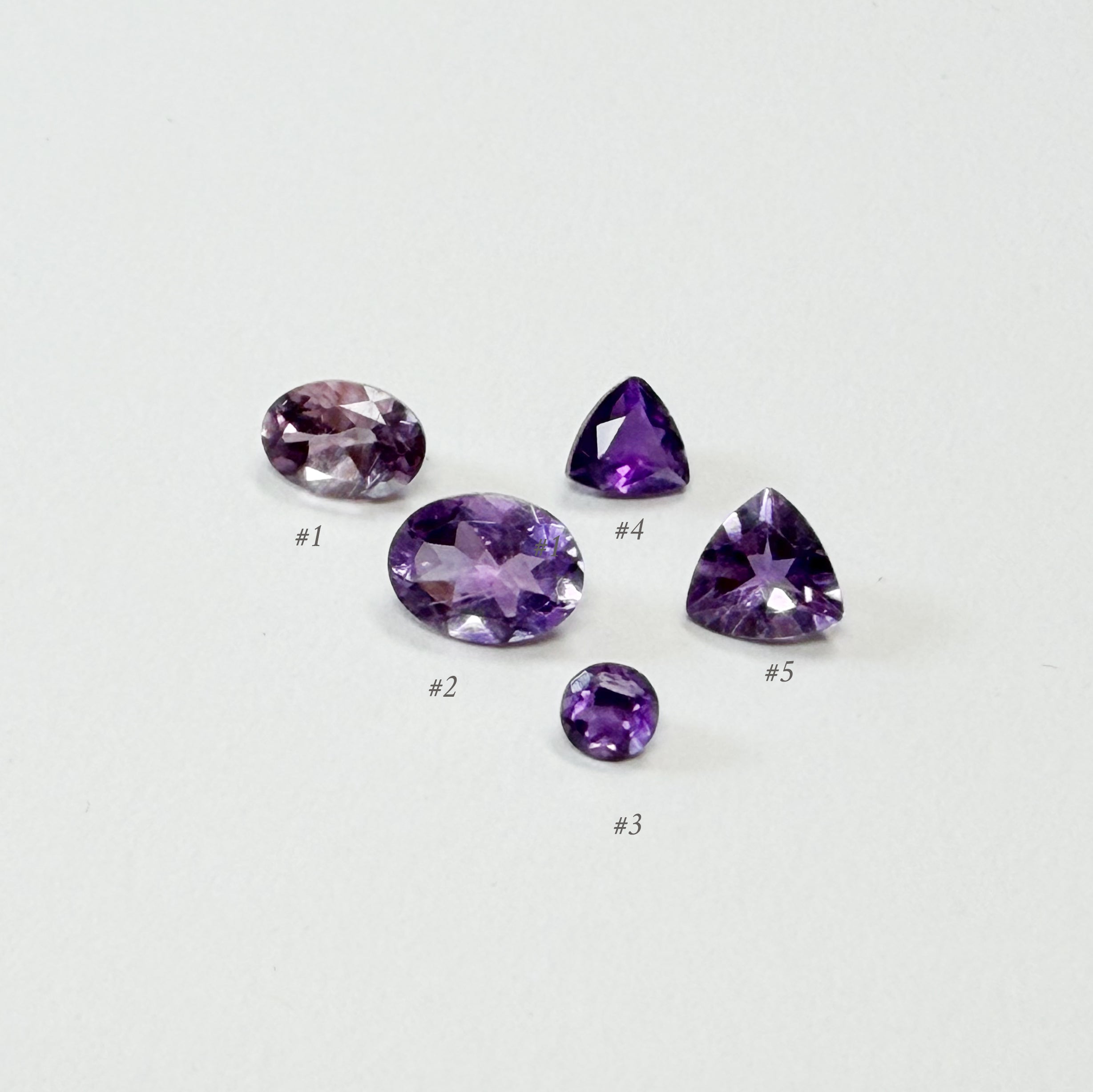 Parcel of Five Various Cuts Natural Amethysts