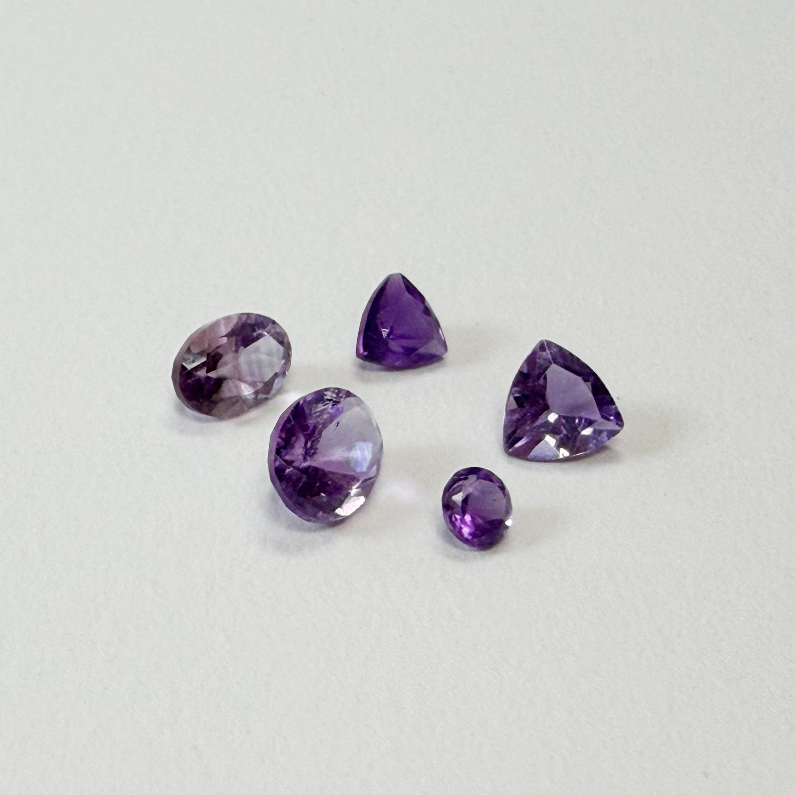 Parcel of Five Various Cuts Natural Amethysts
