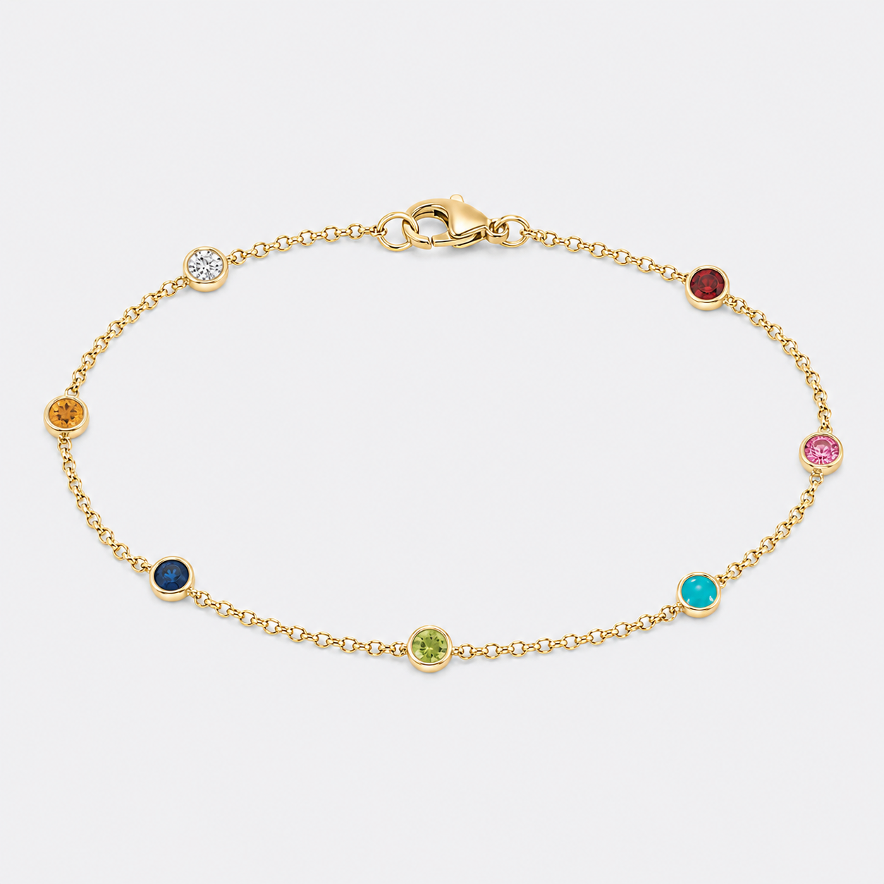 a delicate bracelet with 7 birthstones